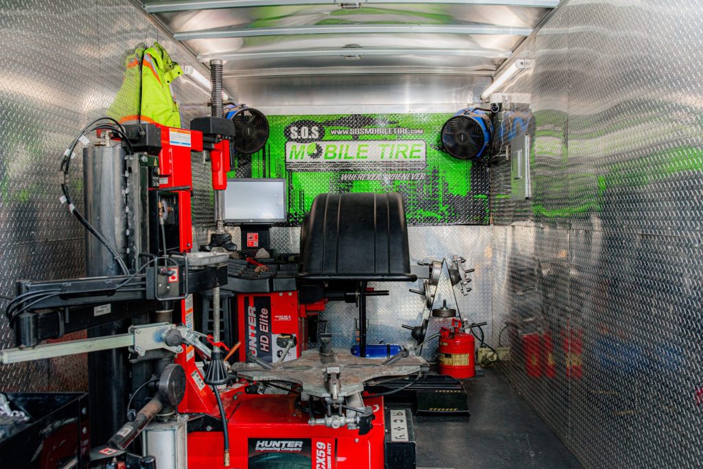 Inside an SOS Mobile Tire mobile service unit with tire service equipment